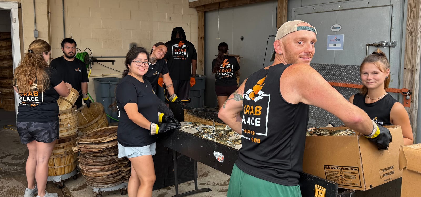 The Crab Place Hard Crab Division crew at the packing line