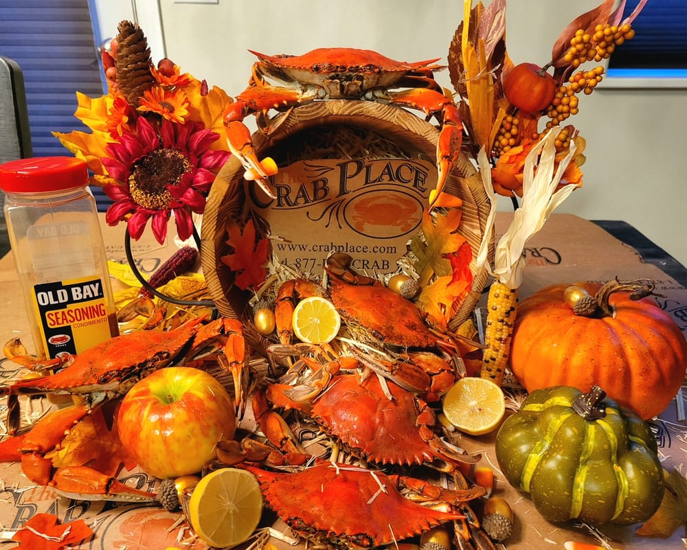 Steamed crabs arranged with pumpkins, sunflowers and a Crab Place basket